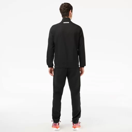 Lacoste Tennis>Sportsuit Tennis-Trainingsanzug Auf Stretch-Gewebe Schwarz / Orange / Burgunder / Weis Lir