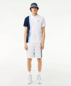 Lacoste Tennis>Tennis Poloshirt Aus Recyceltem Strick-Gewebe Weis / Navy Blau / Blau Lui