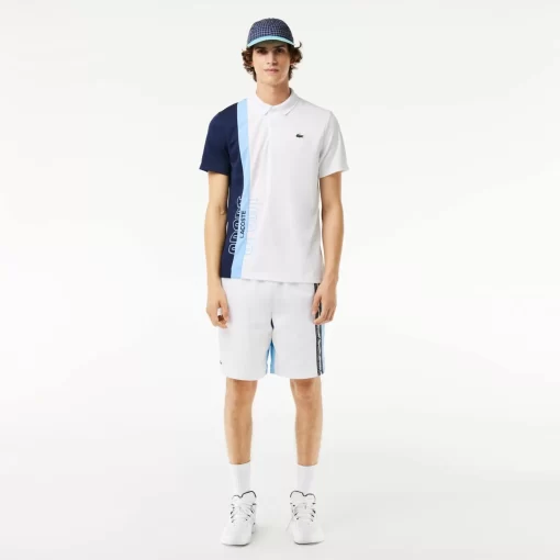 Lacoste Tennis>Tennis Poloshirt Aus Recyceltem Strick-Gewebe Weis / Navy Blau / Blau Lui