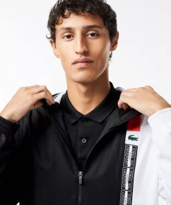 Lacoste Tennis>Tennisjacke Aus Recycelten Fasern Schwarz / Weis / Orange Lji