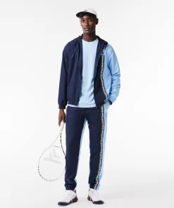 Lacoste Tennis>Tennisjacke Aus Recycelten Fasern Navy Blau / Blau / Weis Lli