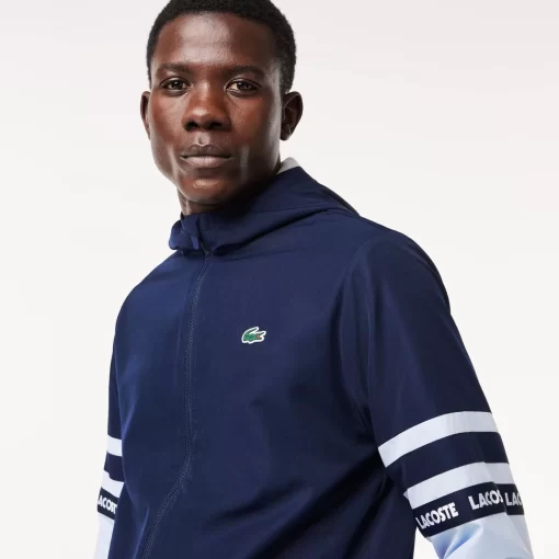 Lacoste Tennis>Tennis-Trainingsjacke Mit Logostreifen Navy Blau / Hellblau Wb3