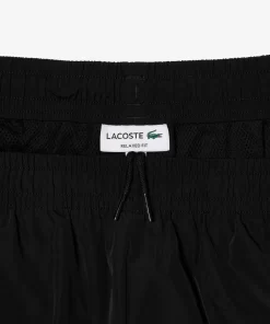 Lacoste Hosen & Shorts>Trainingshosen Mit Kontrast-Detail Im Lassigen Schnitt Schwarz / Neongelb 6Vt