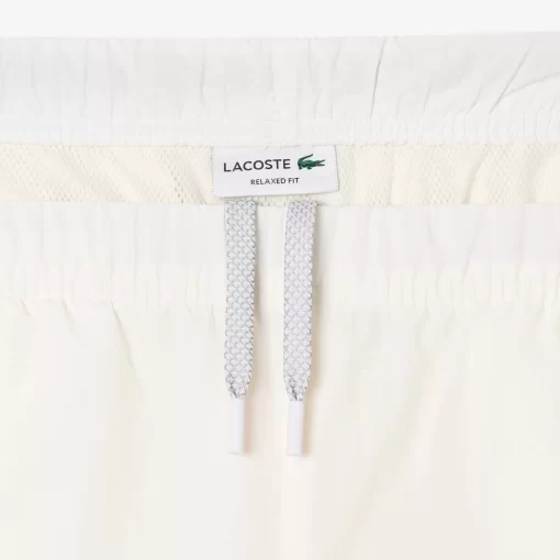 Lacoste Hosen & Shorts>Trainingshosen Mit Streifen-Detail Weis 70V