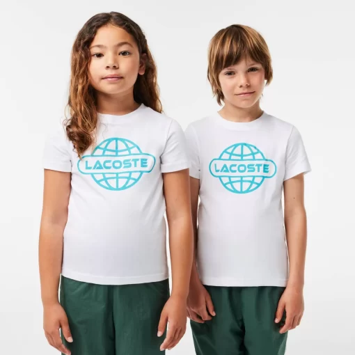 Lacoste Mädchenkleidung>T-Shirt Aus Baumwolljersey Mit Planet-Aufdruck Weis 001