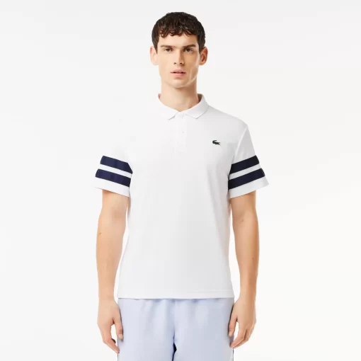 Lacoste Tennis>Ultra-Dry Colourblock Tennis Poloshirt Weis / Navy Blau 522