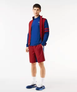 Lacoste Tennis>Ultra-Dry Colourblock Tennis Poloshirt Navy Blau / Burgunder Is4