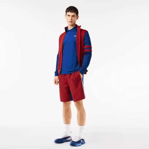 Lacoste Tennis>Ultra-Dry Colourblock Tennis Poloshirt Navy Blau / Burgunder Is4