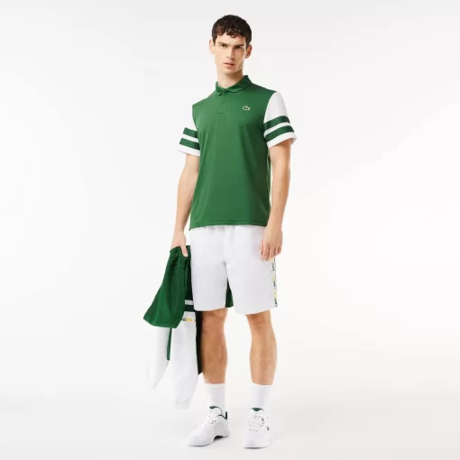 Lacoste Tennis>Ultra-Dry Colourblock Tennis Poloshirt Grun / Weis 291