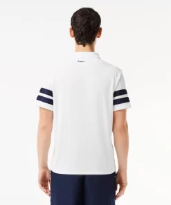 Lacoste Tennis>Ultra-Dry Colourblock Tennis Poloshirt Weis / Navy Blau 522