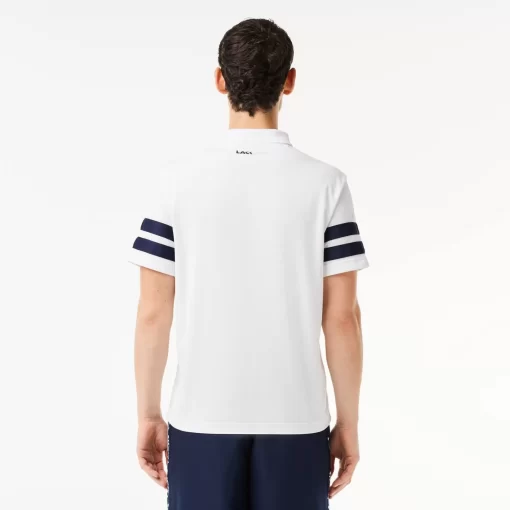 Lacoste Tennis>Ultra-Dry Colourblock Tennis Poloshirt Weis / Navy Blau 522