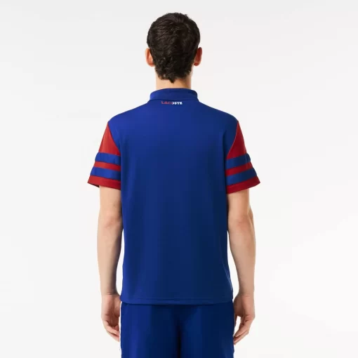 Lacoste Tennis>Ultra-Dry Colourblock Tennis Poloshirt Navy Blau / Burgunder Is4