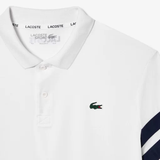 Lacoste Tennis>Ultra-Dry Colourblock Tennis Poloshirt Weis / Navy Blau 522