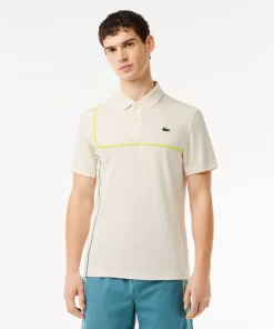 Lacoste Tennis>Ultra-Dry Pique Tennis Poloshirt Weis Avx