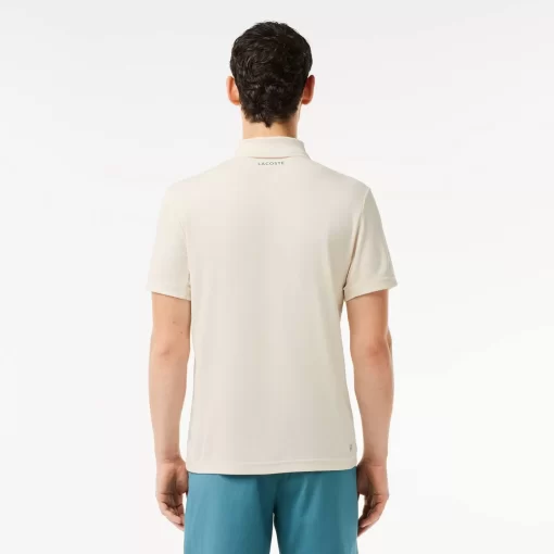 Lacoste Tennis>Ultra-Dry Pique Tennis Poloshirt Weis Avx