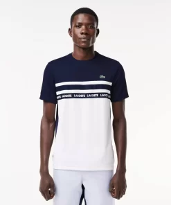 Lacoste Tennis>Ultra-Dry Tennis T-Shirt Aus Pique Mit Logostreifen Weis / Navy Blau 522