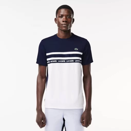 Lacoste Tennis>Ultra-Dry Tennis T-Shirt Aus Pique Mit Logostreifen Weis / Navy Blau 522