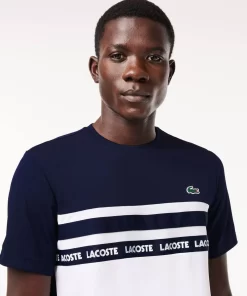 Lacoste Tennis>Ultra-Dry Tennis T-Shirt Aus Pique Mit Logostreifen Weis / Navy Blau 522