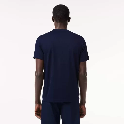 Lacoste Tennis>Ultra-Dry Tennis T-Shirt Aus Pique Mit Logostreifen Weis / Navy Blau 522