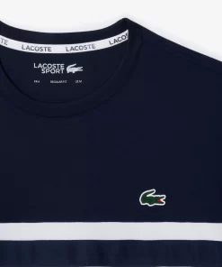 Lacoste Tennis>Ultra-Dry Tennis T-Shirt Aus Pique Mit Logostreifen Weis / Navy Blau 522