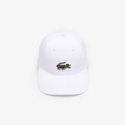 Lacoste Caps & Hüte>Unisex X Netflix Krokodil-Kappe Weis Vif