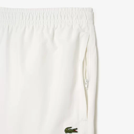 Lacoste Hosen & Shorts>Wasserfeste Trainingshosen Weis 70V